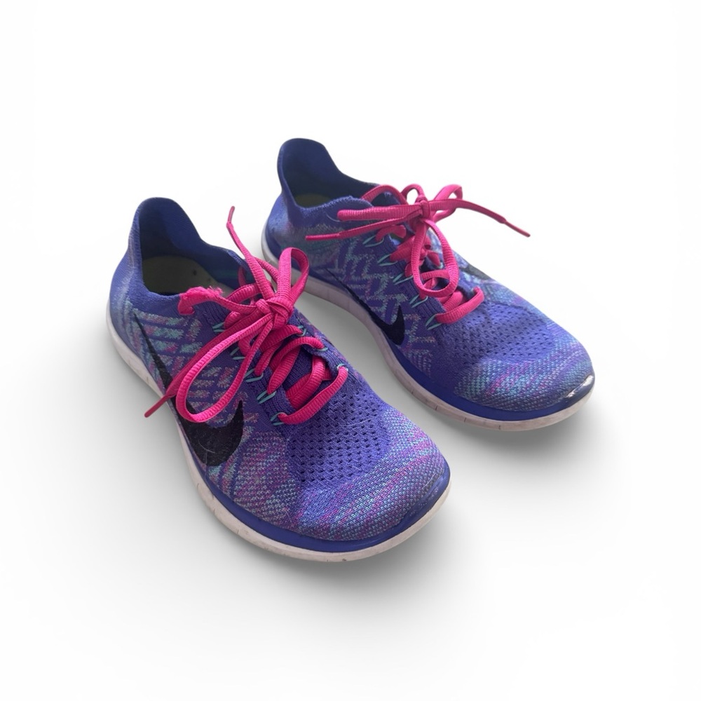 Women's Nike Free 4.0 Flyknit running shoes in size 7